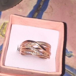 Rose Gold entwined ring in size 8